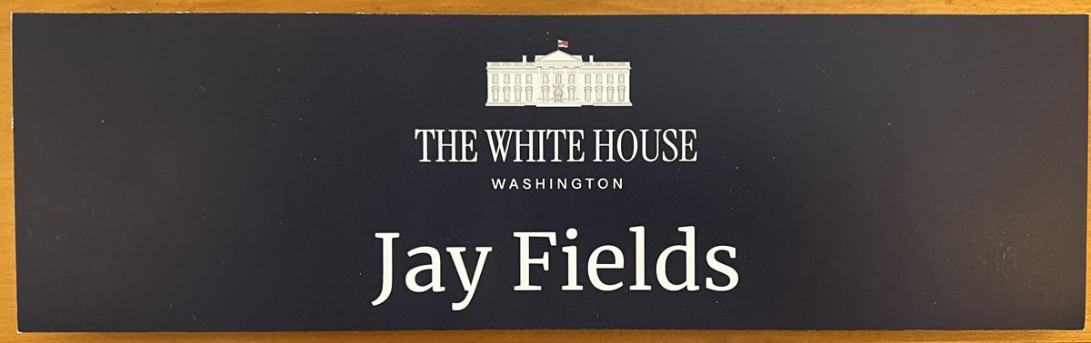 Jay Fields's White House nameplate mounted on a wooden office door in the West Wing.
